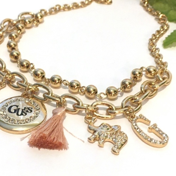 3/$29! GUESS charm necklace tassel, elephant, leaf - Picture 3 of 7